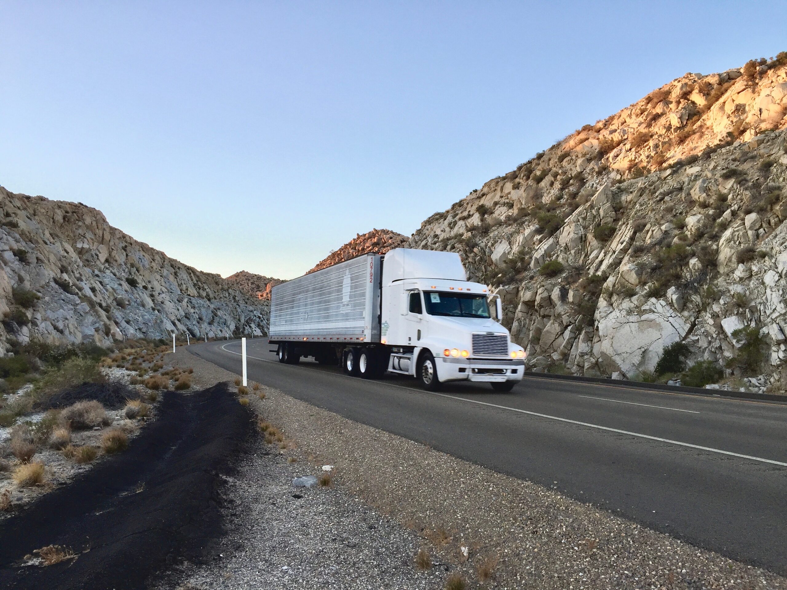 big-rig-on-the-road-through-the-desert-pass-in-cal-2026-03-20-03-14-40-utc